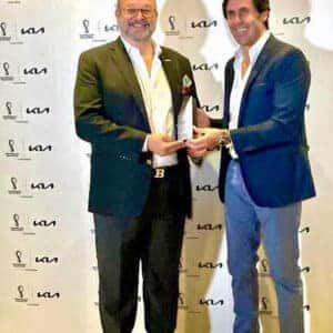 Mario Benedetti receiving an official Kia award