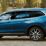 2020 Honda Pilot with family opening trunk cargo space