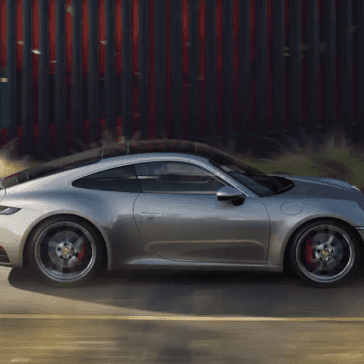 Side view of a 2024 Porsche 911 driving