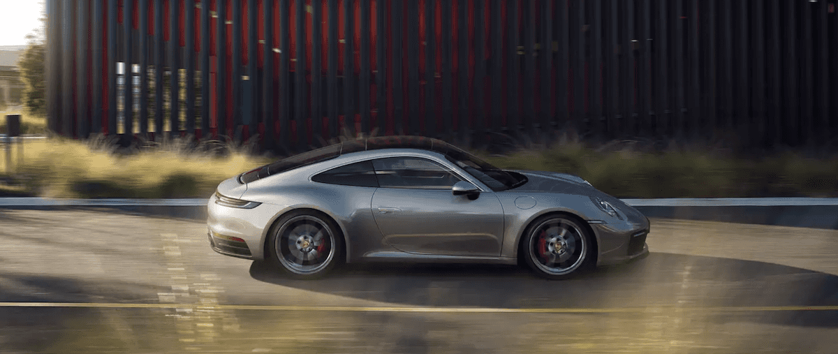 Side view of a 2024 Porsche 911 driving